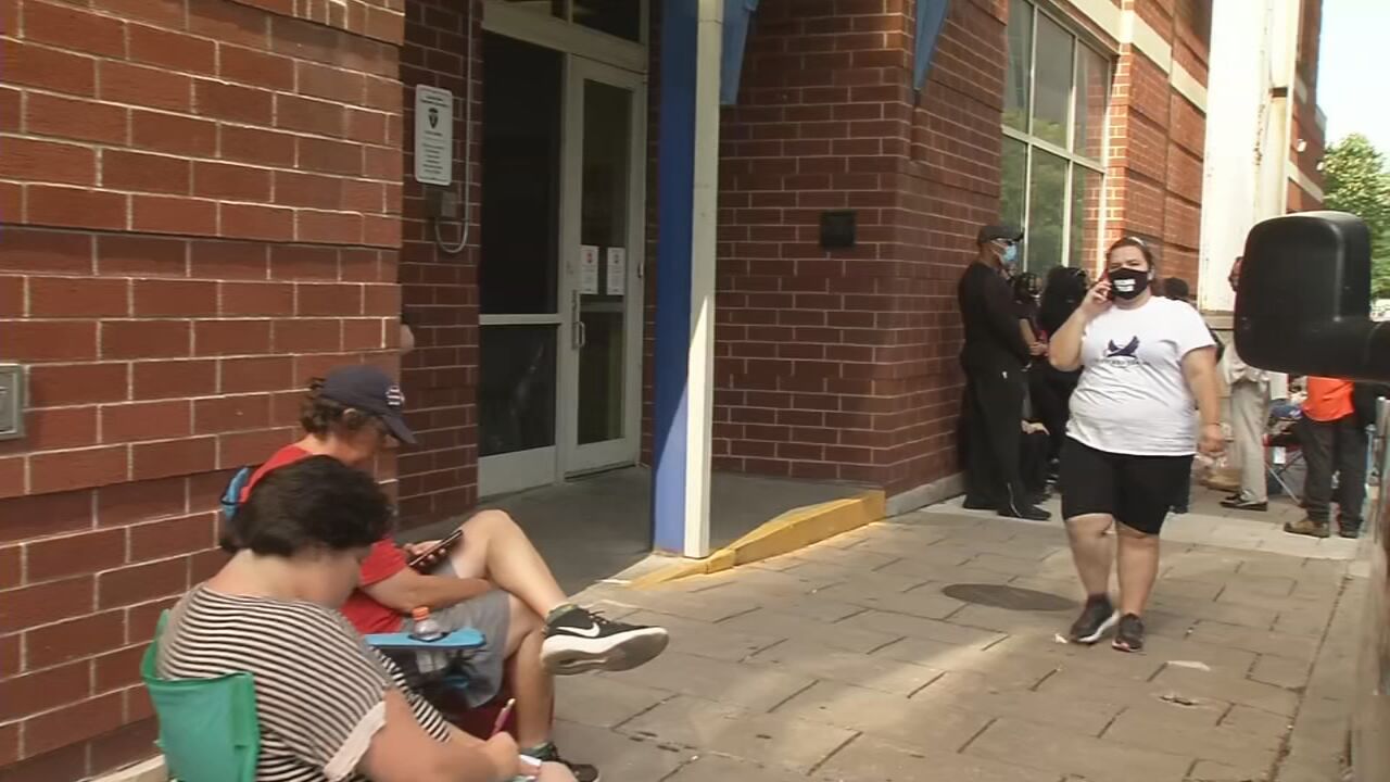 Protesters wait outside Metro Corrections